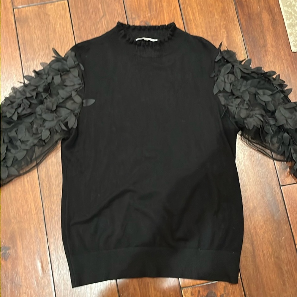 Rich black soft sweater.